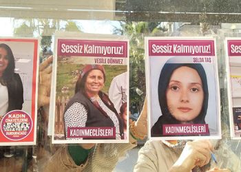 Öldürülen kadınların fotoğraflarını asan kadınlara para cezası