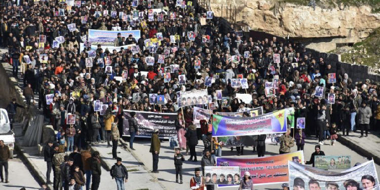 Efrîn’e saldırıların 5’inci yıldönümünde yürüyüş Efrîn’e saldırıların 5’inci yıldönümünde yürüyüş